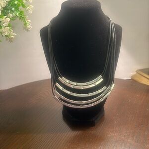 Multistrand black cord necklace - curved bar silver tone sliders & lobster clasp